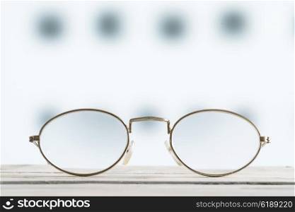 Glasses on a table with bright blurry background