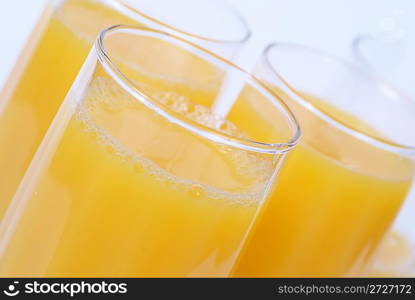 Glasses with orange juice isolated on white