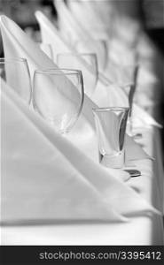 glassware and cocked hat napkins in perspective, rendered into grayscale