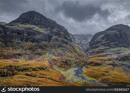 Glencoe - Three Sister. Cloudy and rainy october midday. Scottish highland, Scotland.