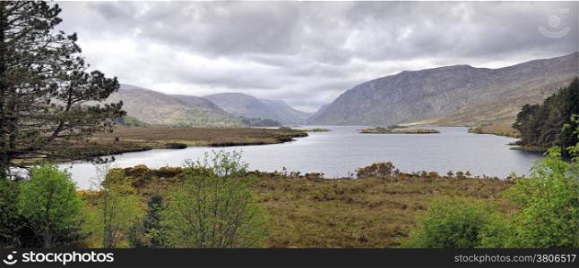 "Glenveagh lake. County Dionegal. Glenveagh (from Irish Gleann Bheatha, meaning "glen of the birches") is the second largest national park in Ireland"
