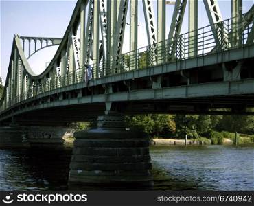 Glienicker Bruecke-Froschperspektive. Detail of the Glienicker Bridge, which connects Berlin and Potsdam