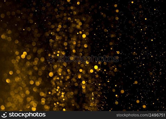 Glitter abstract magical background. Gold dust particles.