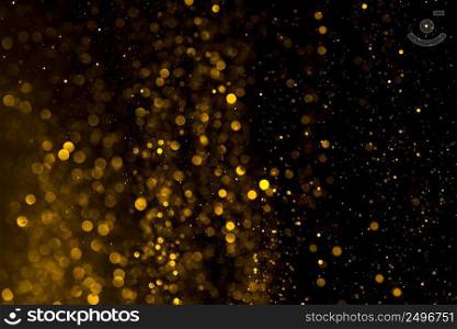 Glitter abstract magical background. Gold dust particles.