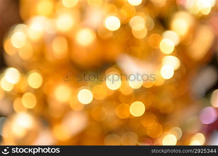 Glittering golden Christmas background blurred