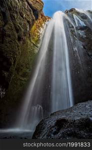 Gljufrabui secret waterfall hidden in a cave in Iceland. Gljufrabui waterfall hidden in a cave, Iceland