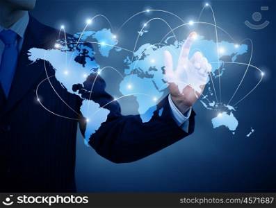 Global business. Close up of businessman touching icon of media screen