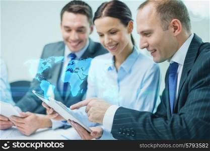 global business, technology and people concept - smiling business team with tablet pc computer and world map virtual projection having discussion in office