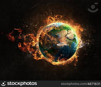 Global catastrophe concept. Burning Earth Planet on dark background. Elements of this image are furnished by NASA