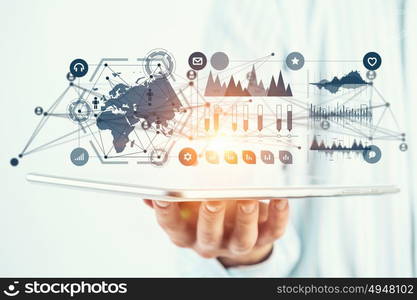 Global connection. Hand of businessman holding touchpad pc presenting social network concept