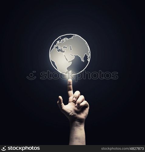 Global connection. Human hand pointing with finger on Earth planet