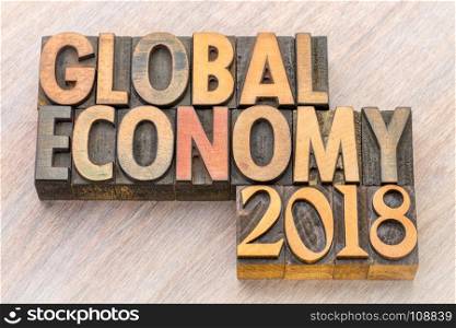 global economy 2018 word abstract in vintage letterpress wood type