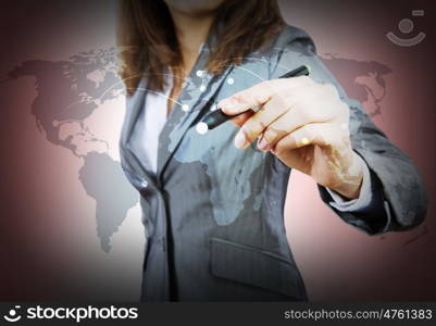 Global interaction. Close up of businesswoman drawing world map with pen