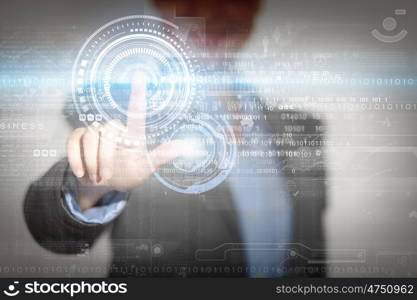 Global interaction. Close up of businesswoman touching media screen with finger