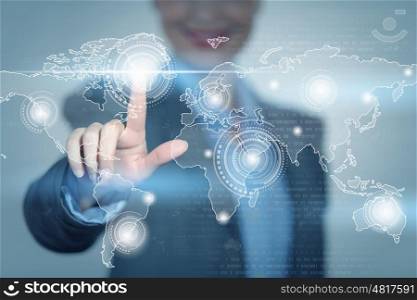 Global interaction. Close up of businesswoman touching media screen with finger