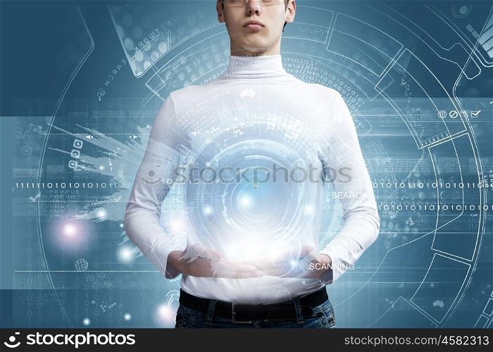 Global media technologies. Young man holding digital Earth planet in hands