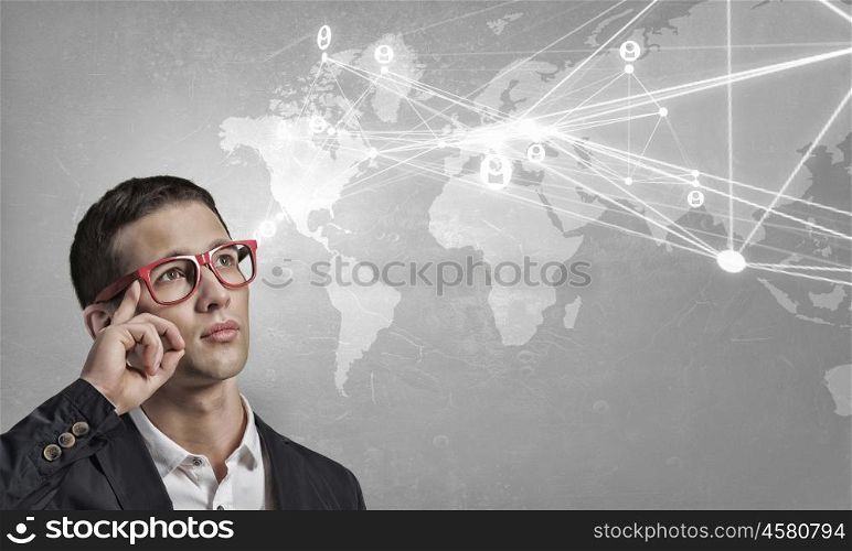 Global net connection. Modern communication technology concept and student guy in glasses