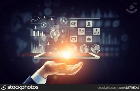 Global network connection. Hand of businessman holding touchpad pc presenting social network concept