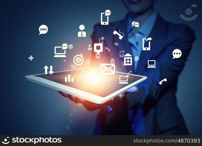 Global network connection. Hand of businesswoman holding touchpad pc presenting social network concept