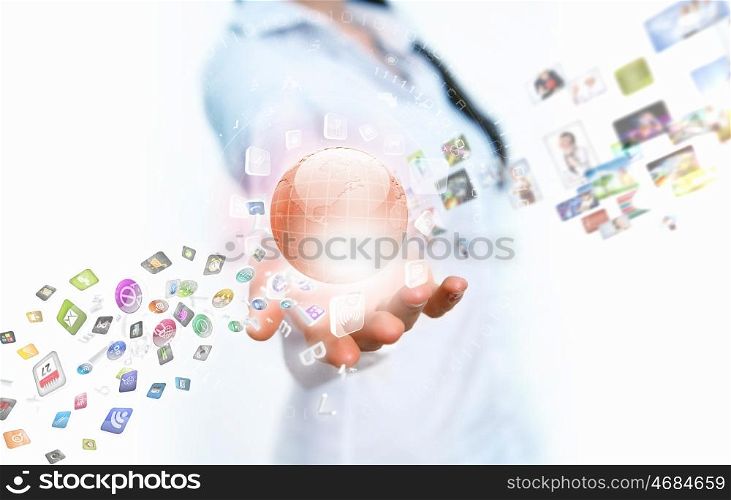 Global technologies. Image of globe on palm of businesswoman. Media technologies