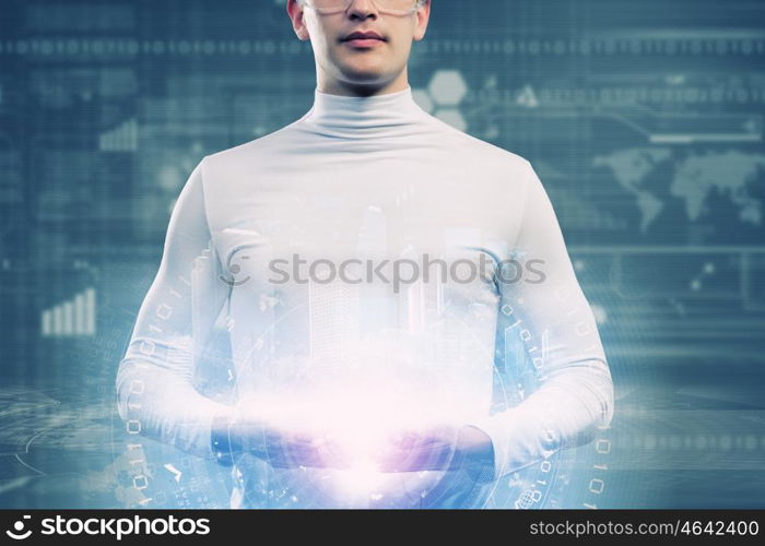 Global technologies. Man holding globe in hands. Futuristic concept