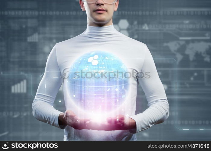 Global technologies. Man holding globe in hands. Futuristic concept