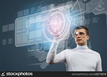 Global technologies. Man in white touching icon of media screen