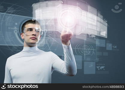 Global technologies. Man in white touching icon of media screen