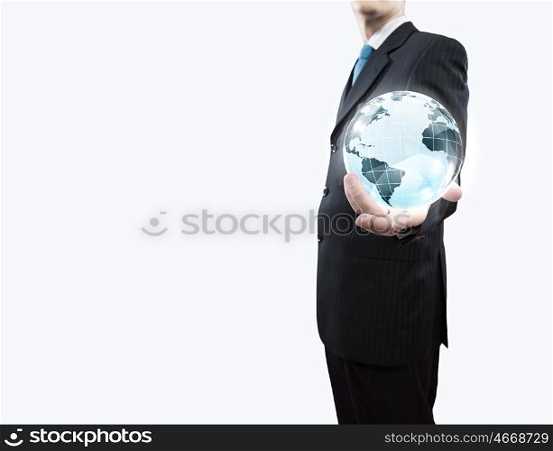Global technologies. Young businessman holding Earth planet in palm