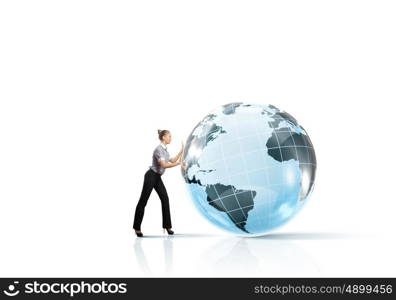 Global technologies. Young successful businesswoman pushing Earth planet ball