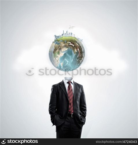 Global thinking. Business man with globe for head. Elements of this image are furnished by NASA