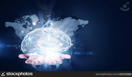 Global thinking. Businesswoman hold brain digital image on hand