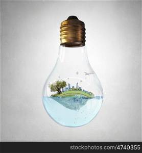 Global warming concept. Glass light bulb with water and cityscape inside