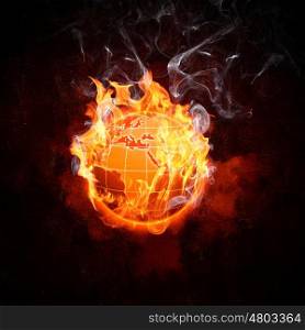 Globe in fire flames. Image of burning globe in fire flames. Earth in danger