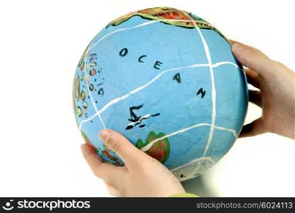 globe in woman hands, isolated on white