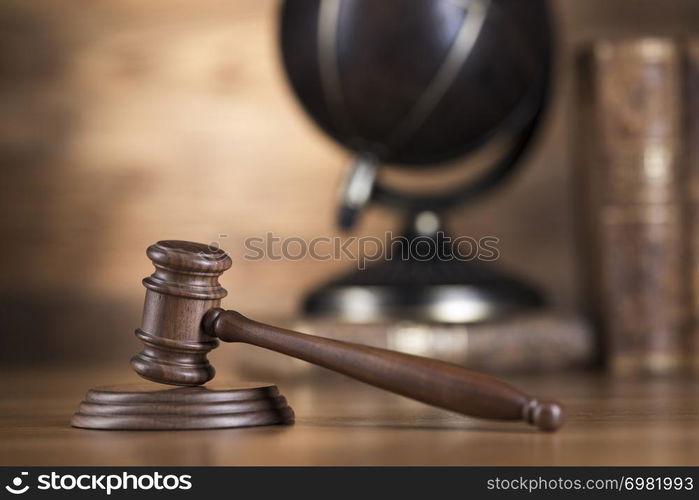 Globe, Law theme, mallet of judge, wooden gavel