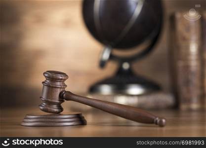 Globe, Law theme, mallet of judge, wooden gavel