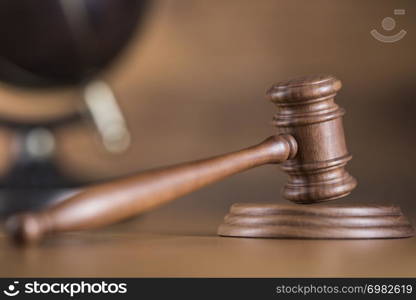 Globe, Law theme, mallet of judge, wooden gavel