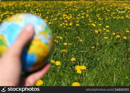 globe of planet earth in man hand