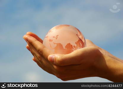 globe on the human hand