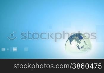 Globe with lens flare on blue background
