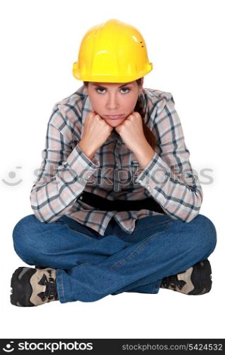 Gloomy female construction worker