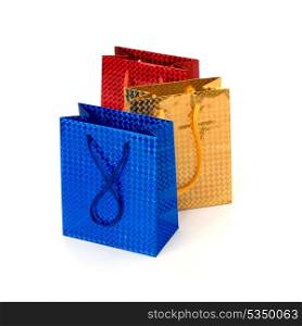Glossy festive gift bags isolated on white background