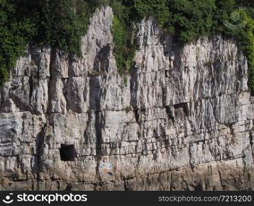 Gloucester Hole in the limestone cliffs of the River Wye in Chepstow, UK. Gloucester hole in Chepstow