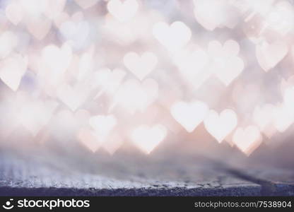 Glowing beautiful golden bokeh lights background. Vintage style. Love Valentine&rsquo;s Day concept.. Bokeh hearts background