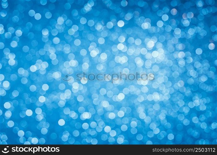 Glowing blue bokeh lights background