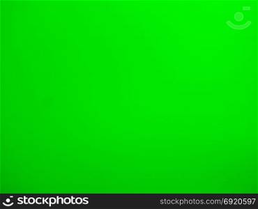 glowing neon light green glass surface background. glowing shimmering neon lights green glass surface useful as a background