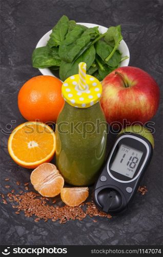 Glucometer for checking sugar level and freshly blended coctail from fruits and vegetables, diabetes and healthy dessert containing natural vitamins and minerals concept. Glucometer for checking sugar level and freshly blended coctail from fruits and vegetables, diabetes and healthy dessert containing vitamins concept