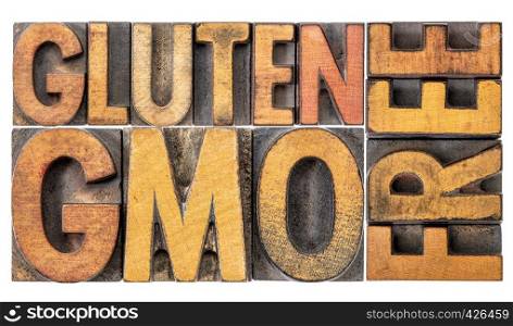 gluten and GMO (genetically modified organism) free banner - isolated word abstract in vintage letterpress wood type stained by inks
