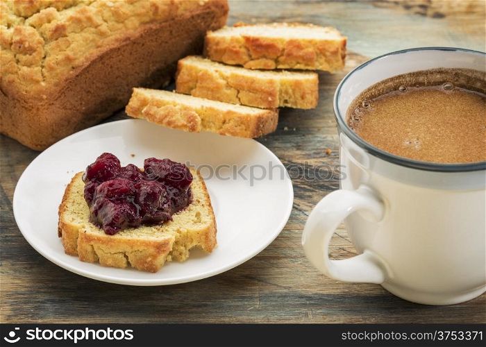 gluten free breakfast - bread made with coconut and almond flour, and flax meal, sugar free cranberry sauce with blueberries and coffee